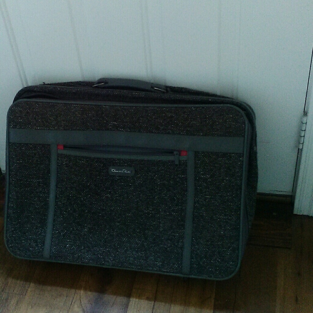 Oscar De la Renta suit case